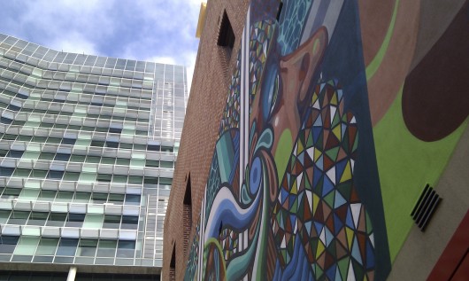 mural by Beastman and Vans the Omega and skyscraper at 140 in Perth
